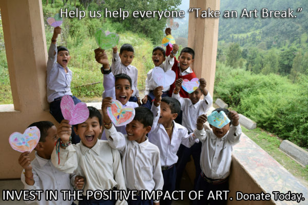 A group of kid's celebrate after receiving an opportunity to take an art break.