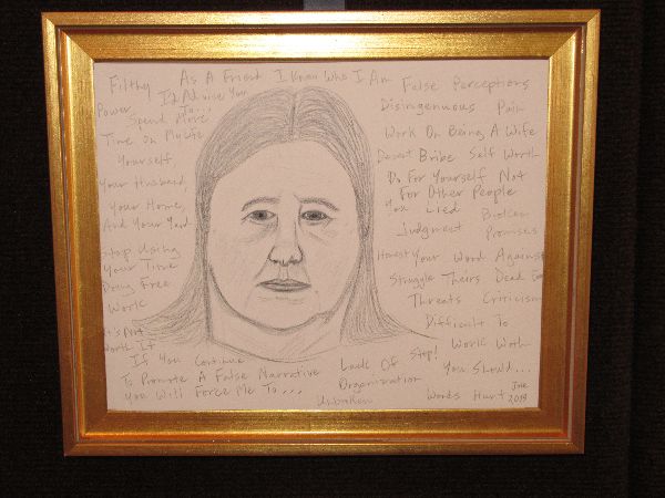self portrait drawn with pencil surrounded by text in a gold frame